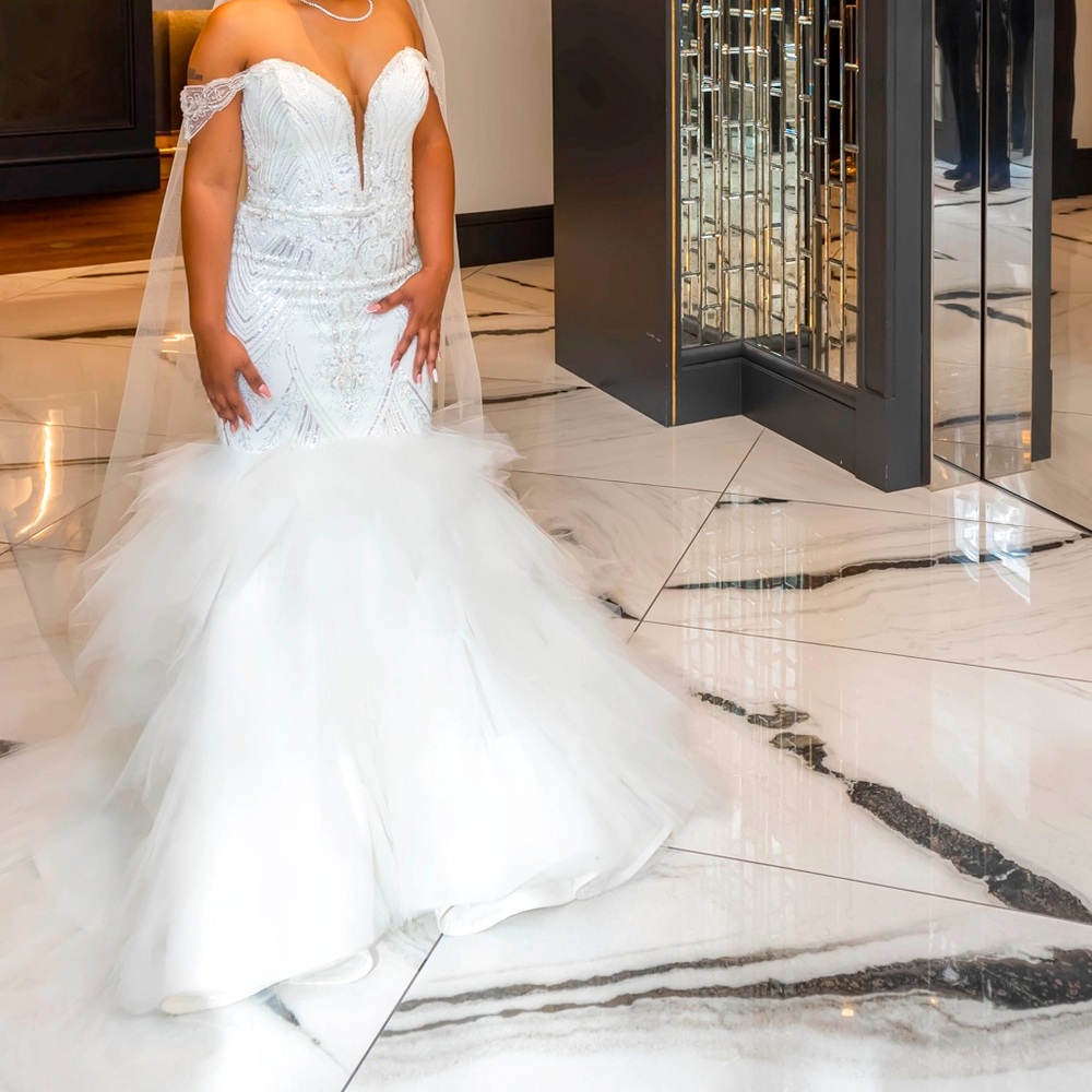 Custom wedding dress. Average dress size 12.
